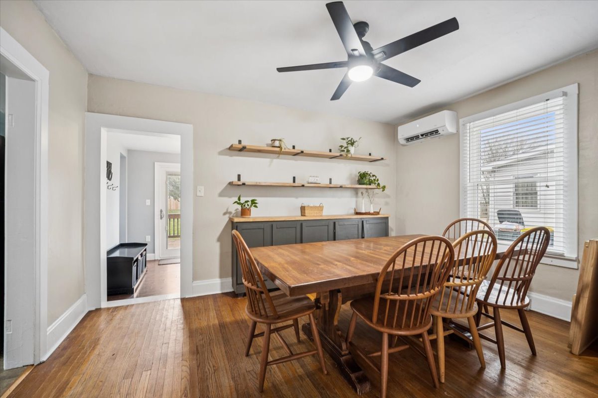 128 North Hadsall Street Genoa, IL 60135 - Photo 6 of 21 a view of a dining room with furniture window and wooden floor