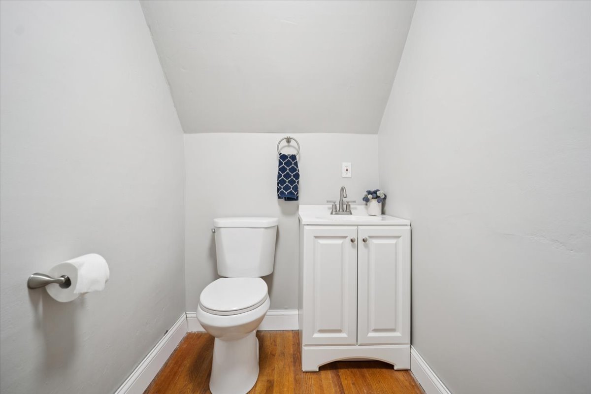 128 North Hadsall Street Genoa, IL 60135 - Photo 10 of 22 a bathroom with a toilet and a sink