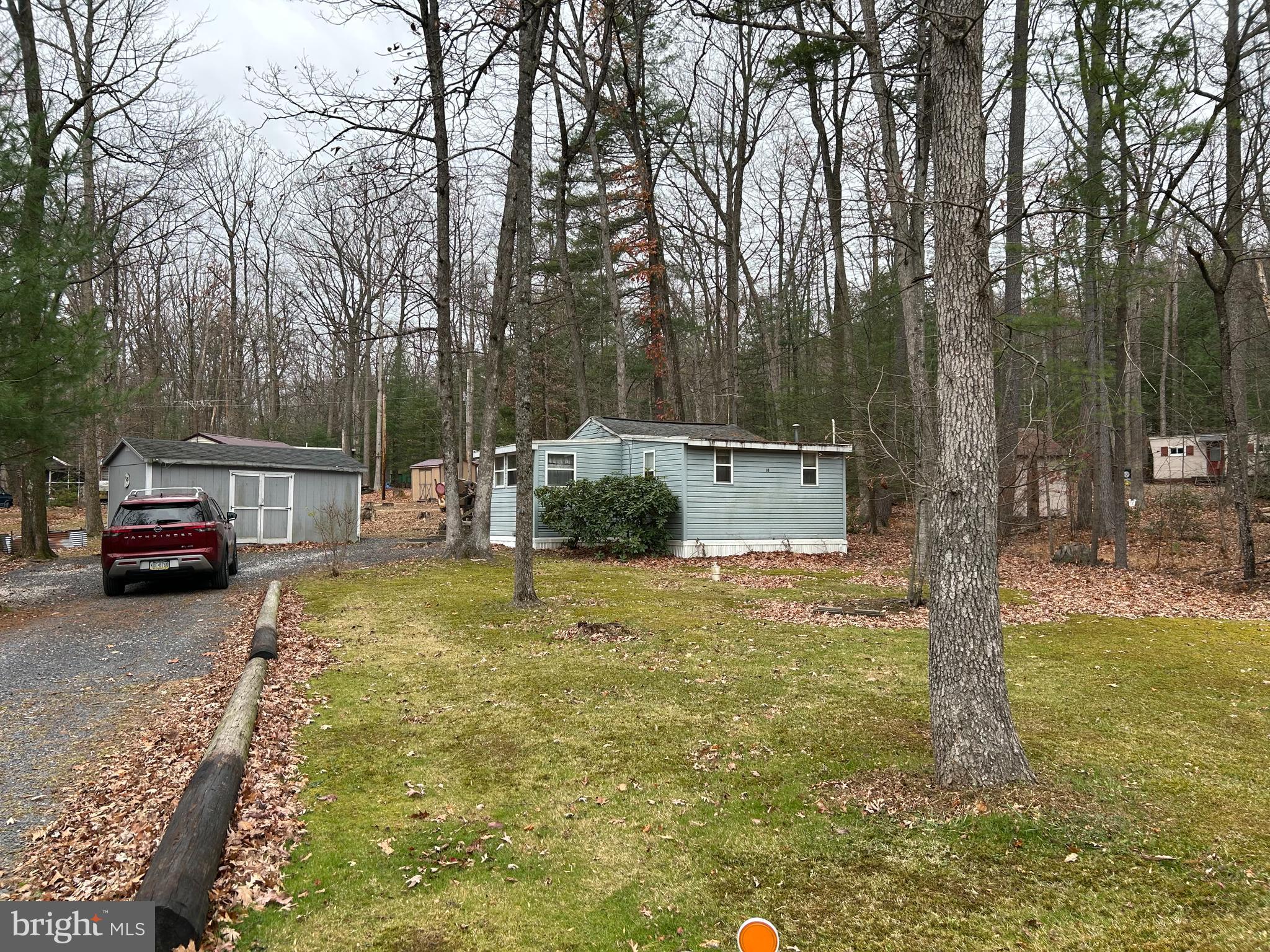 30 Pine Tree Trail Orrtanna, PA 17353 - Photo 1 of 12 a view of a yard with tiny house