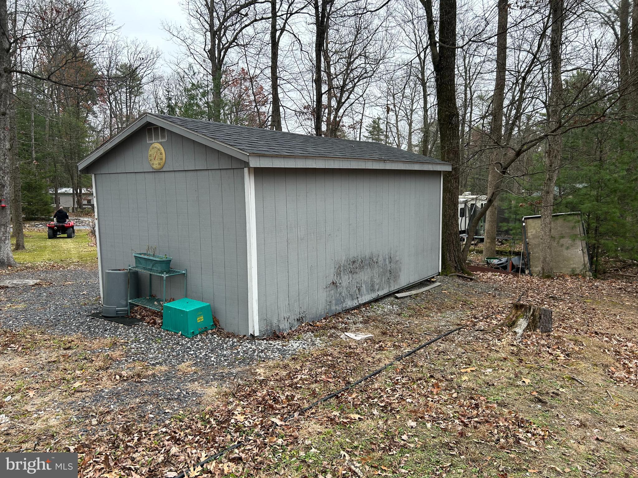 30 Pine Tree Trail Orrtanna, PA 17353 - Photo 5 of 12 a view of a house with large trees and a barn