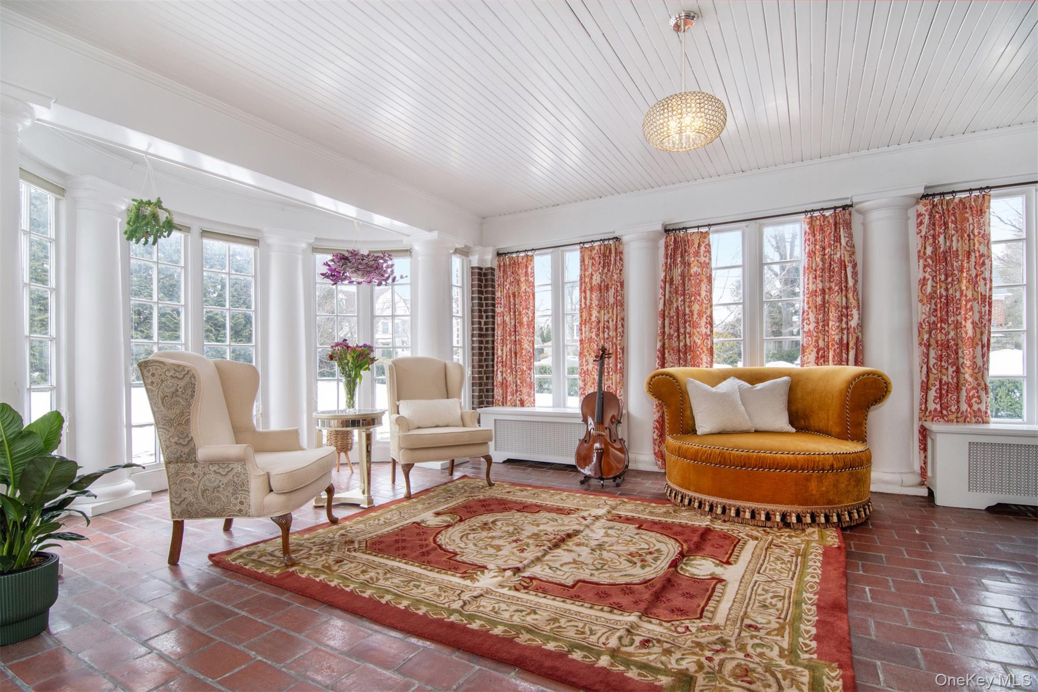 4610 Boston Post Road Pelham, NY 10803 - Photo 11 of 32 a living room with furniture and a large window