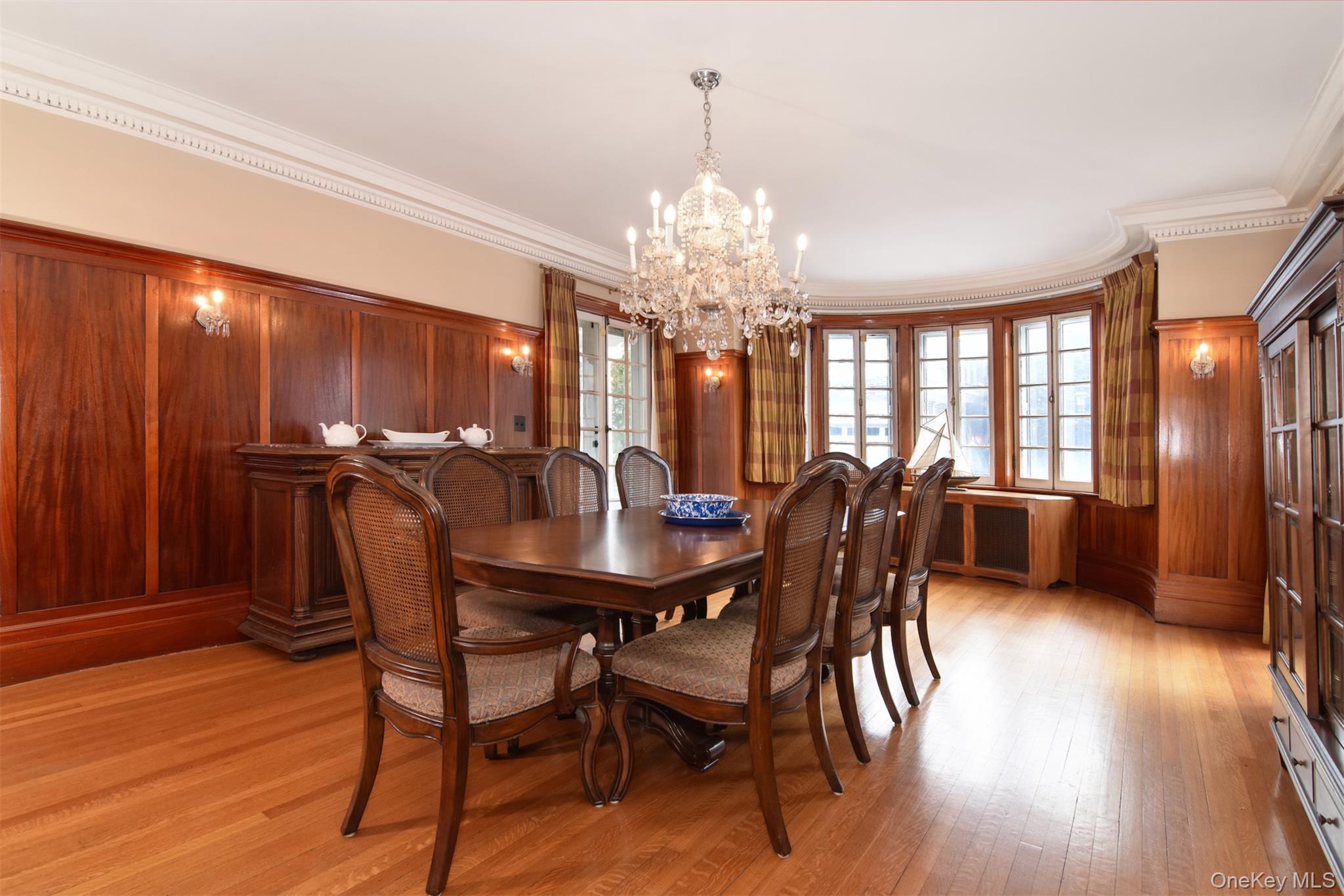 4610 Boston Post Road Pelham, NY 10803 - Photo 17 of 32 a view of a dining room with furniture window and wooden floor