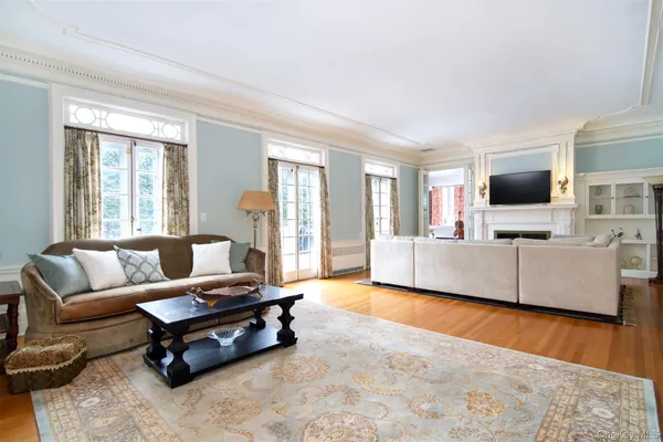 a kitchen with stainless steel appliances a stove a microwave and a refrigerator