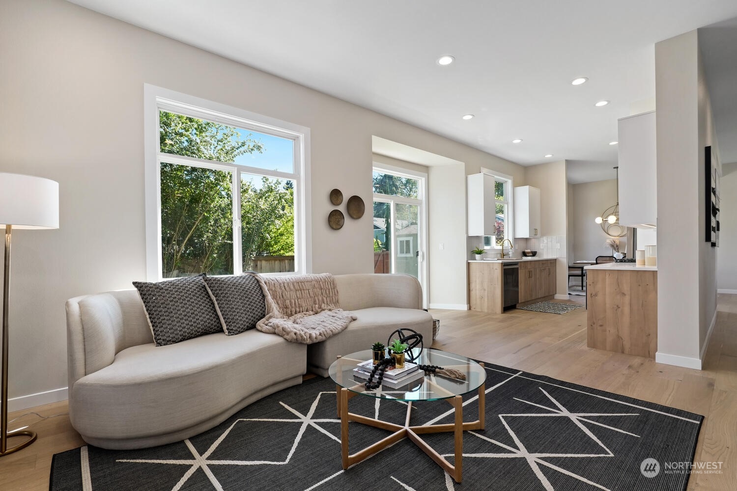 1332 237th Place Southwest Bothell, WA 98021 - Photo 15 of 29 a living room with furniture and a large window