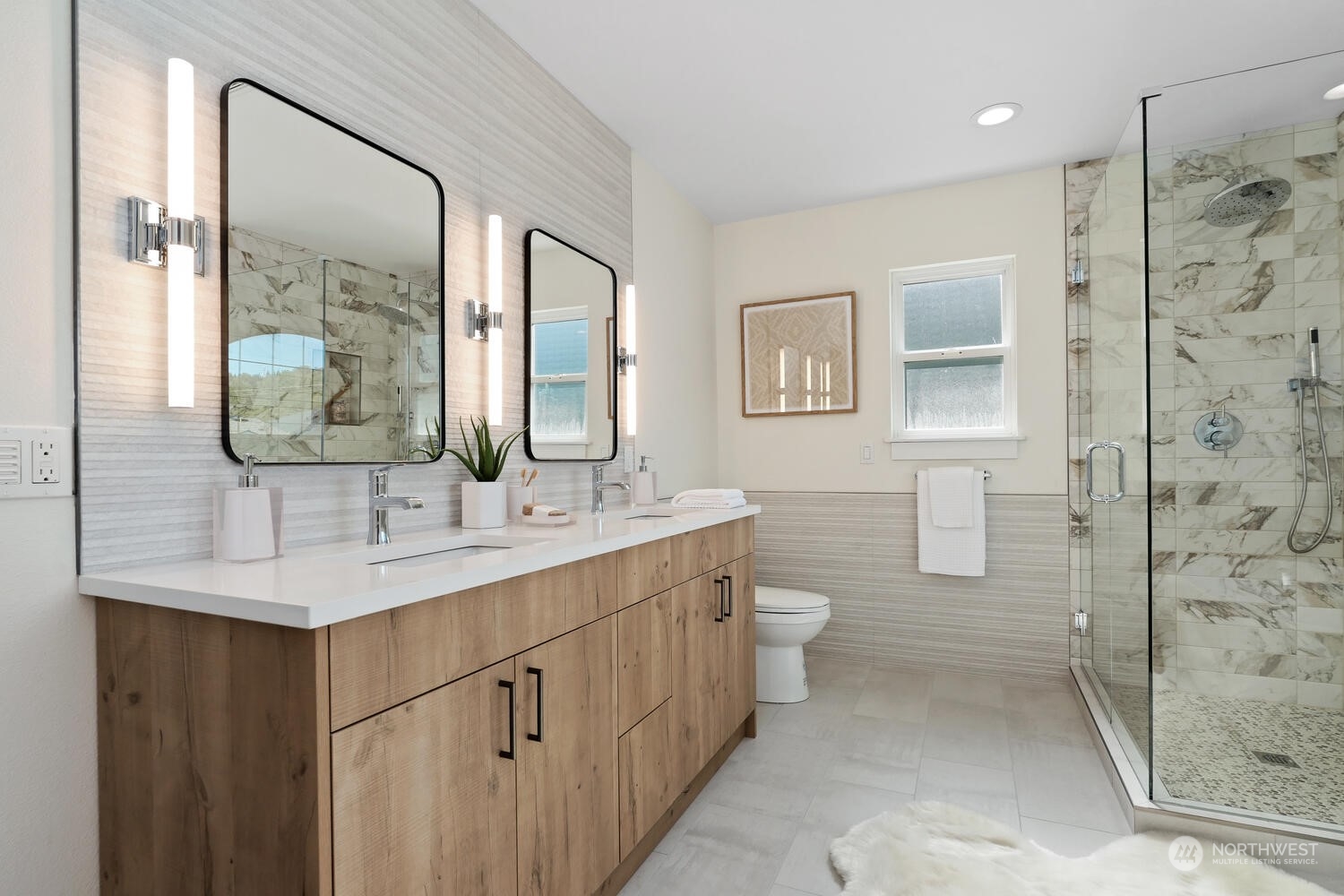 1332 237th Place Southwest Bothell, WA 98021 - Photo 19 of 29 a bathroom with a double vanity sink mirror and shower