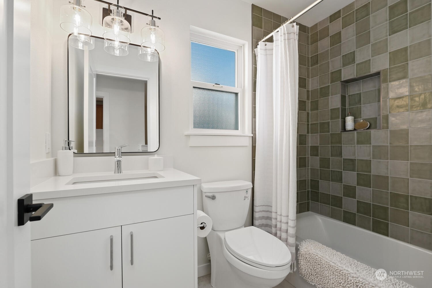 1332 237th Place Southwest Bothell, WA 98021 - Photo 23 of 29 a bathroom with a sink a toilet and shower