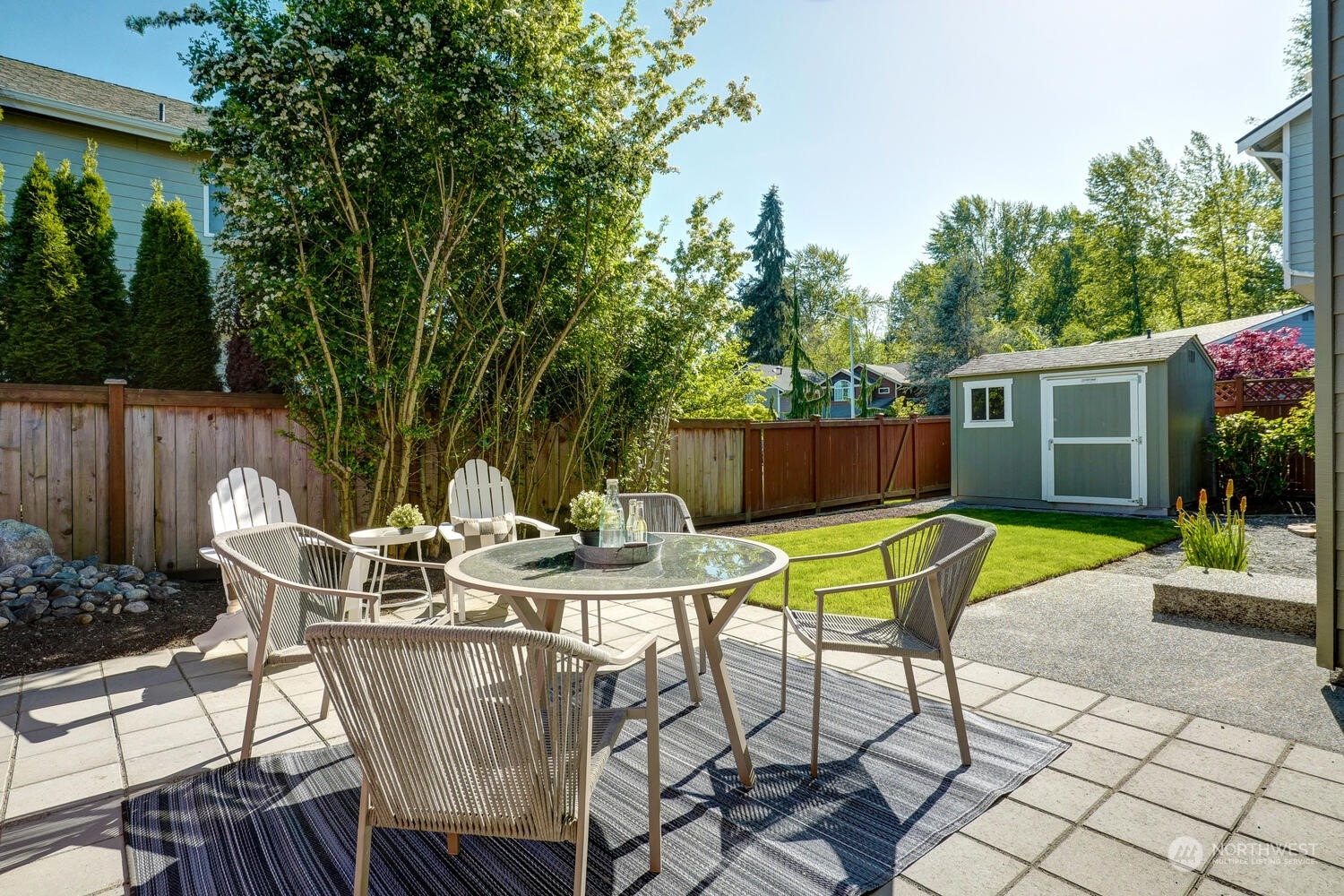 1332 237th Place Southwest Bothell, WA 98021 - Photo 26 of 29 a view of a table and chairs in the patio