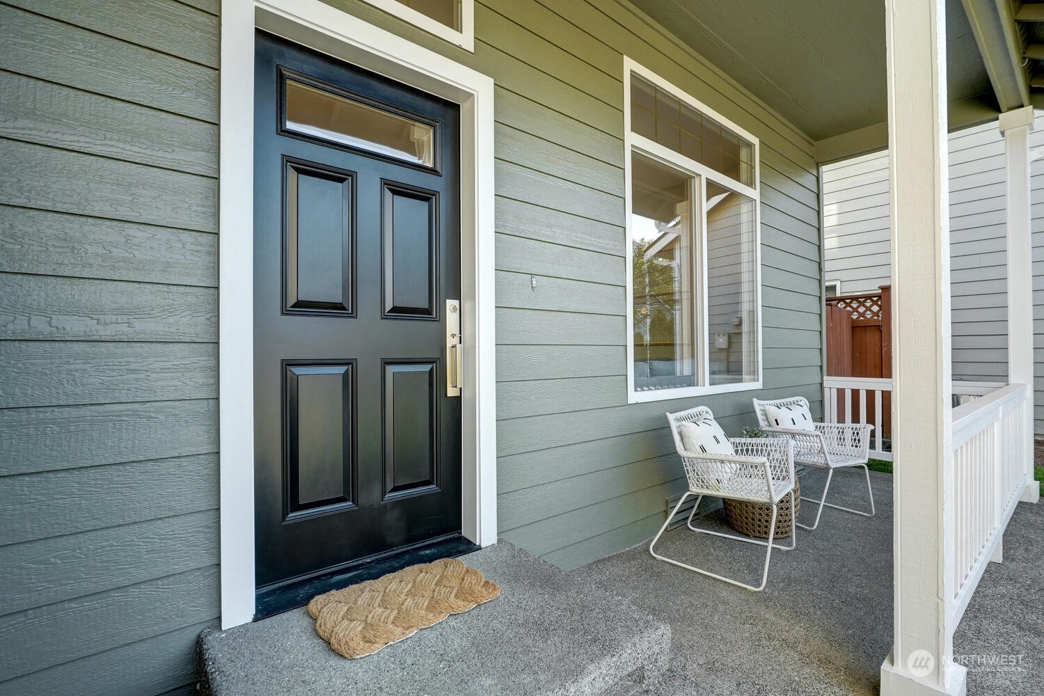 1332 237th Place Southwest Bothell, WA 98021 - Photo 3 of 29 a view of a chair and table in front of house