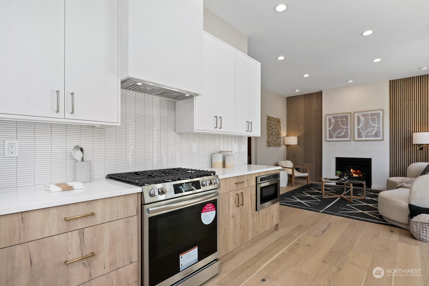 1332 237th Place Southwest Bothell, WA 98021 - Photo 9 of 29 a kitchen with a stove sink and cabinets