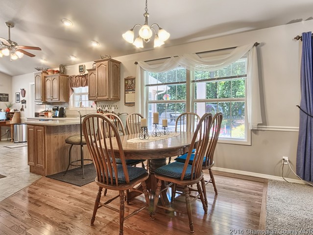 7841 Buttercup Road Weldon, IL 61882 - Photo 9 of 24 a view of a dining room with furniture window and wooden floor