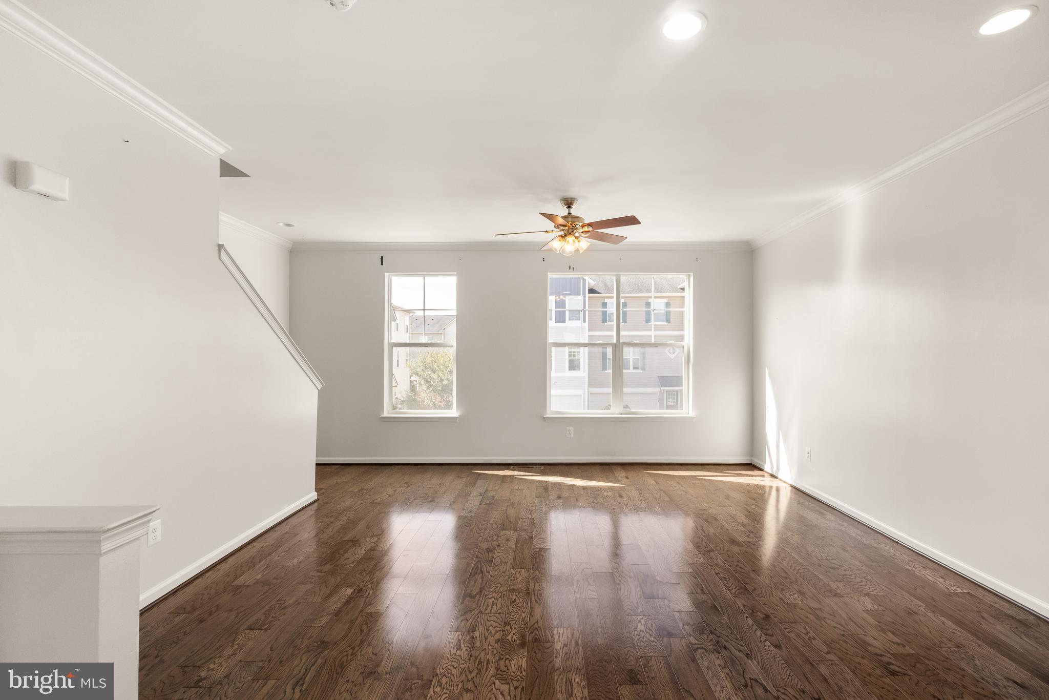111 Rotunda Drive Stephenson, VA 22656 - Photo 15 of 33 a view of an empty room with wooden floor and a window