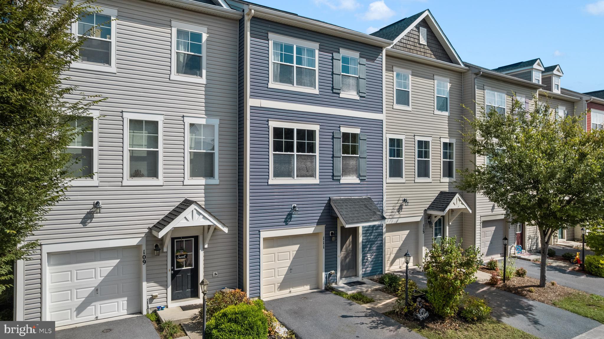 111 Rotunda Drive Stephenson, VA 22656 - Photo 2 of 33 a front view of a house with garden