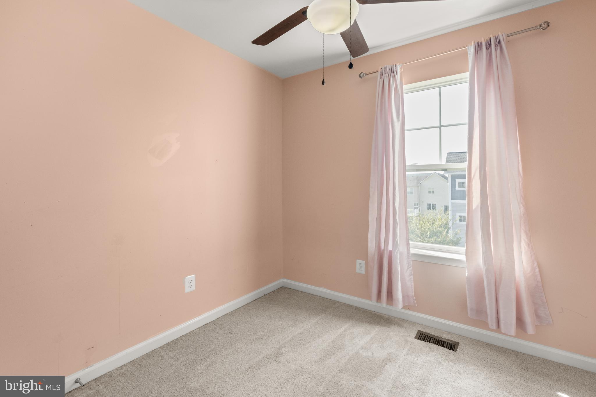 111 Rotunda Drive Stephenson, VA 22656 - Photo 23 of 33 an empty room with windows