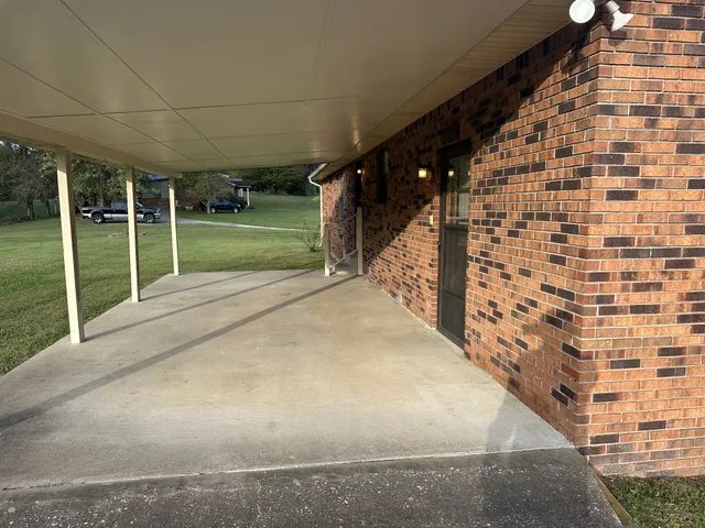 a kitchen with a refrigerator and a stove