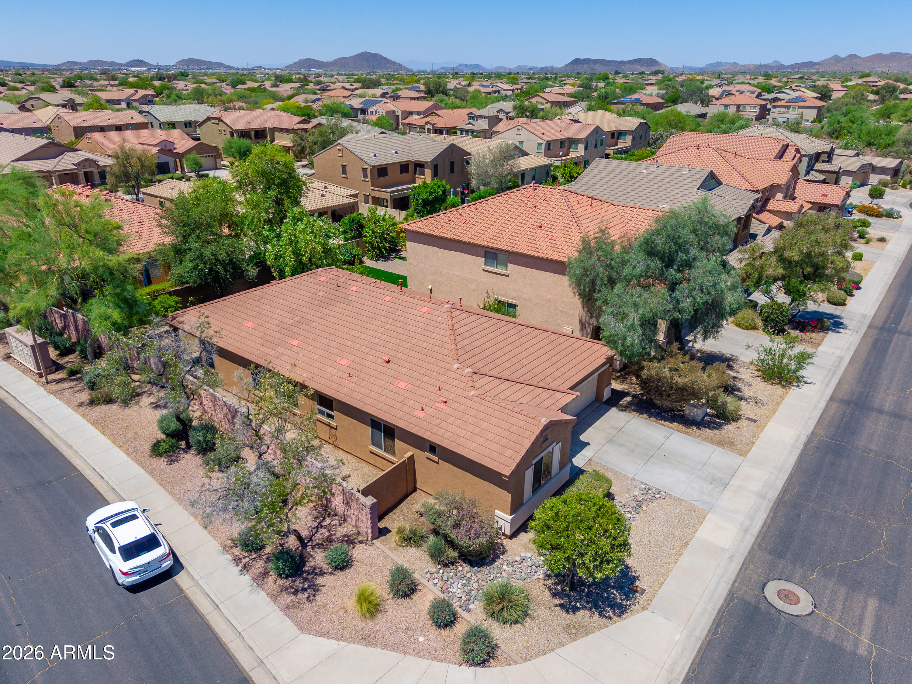 4317 East Folgers Road Phoenix, AZ 85050 - Photo 30 of 40 an aerial view of a house with a garden