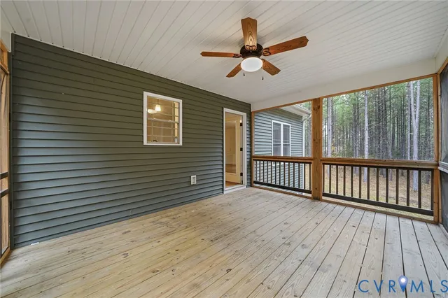 a view of a livingroom with a ceiling fan