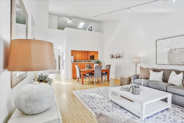 a living room with furniture and a table