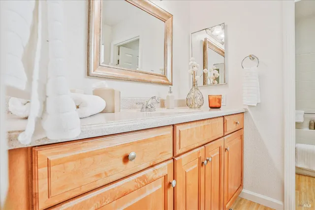 a bathroom with a sink and a mirror