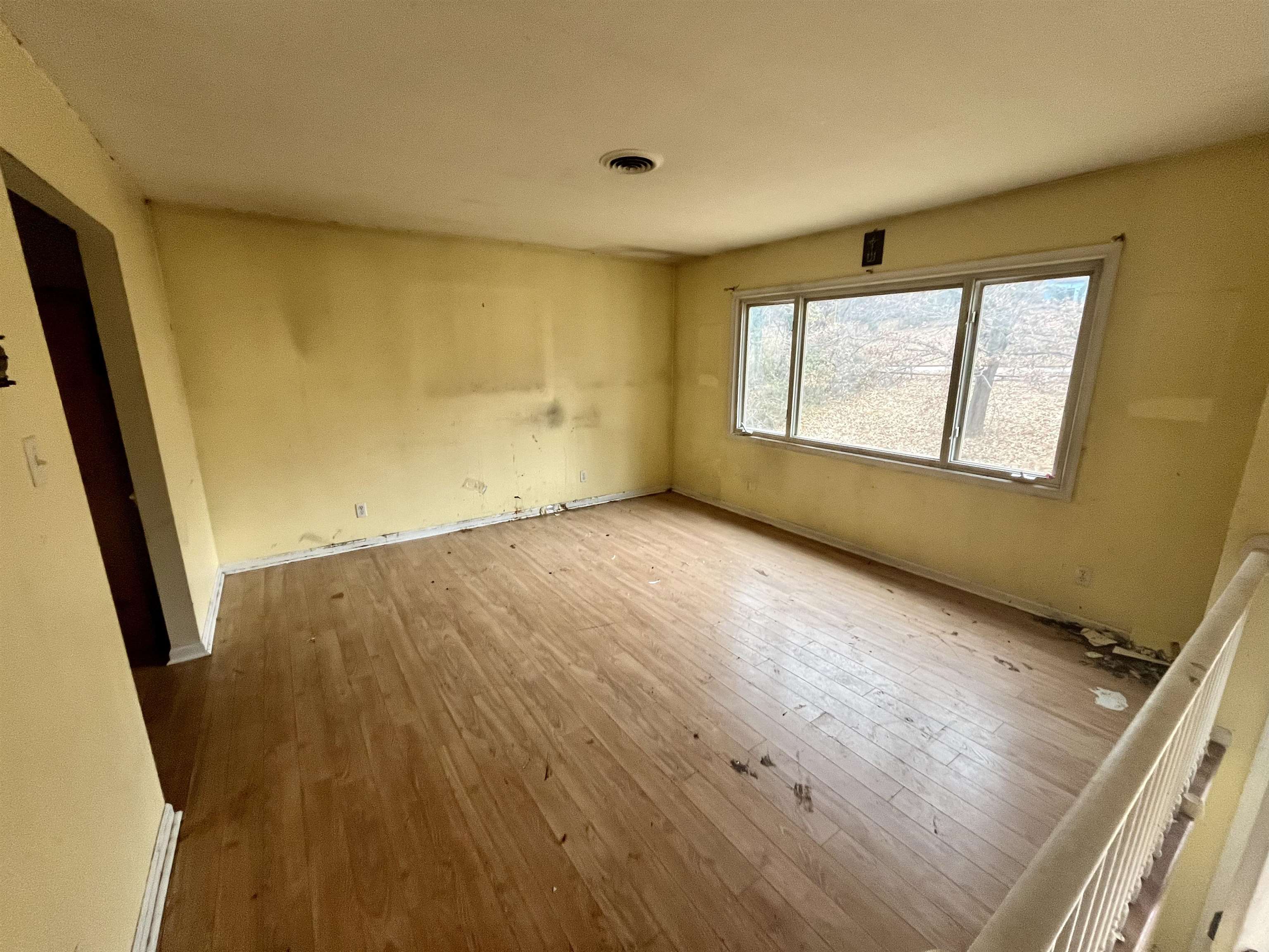 3672 Airport Acres Road Charlottesville, VA 22911 - Photo 11 of 49 an empty room with wooden floor and windows