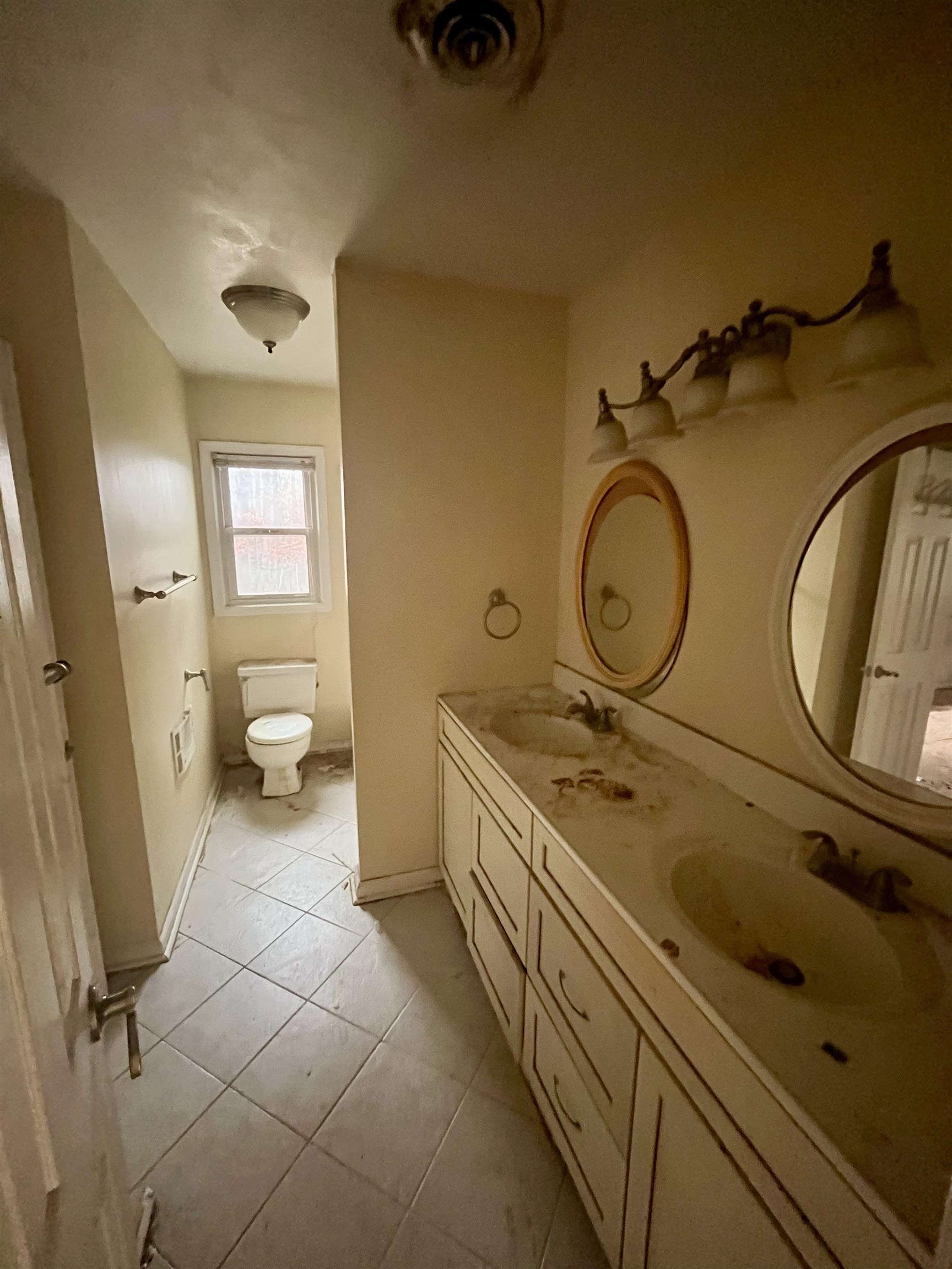3672 Airport Acres Road Charlottesville, VA 22911 - Photo 17 of 49 a bathroom with a granite countertop toilet sink and mirror
