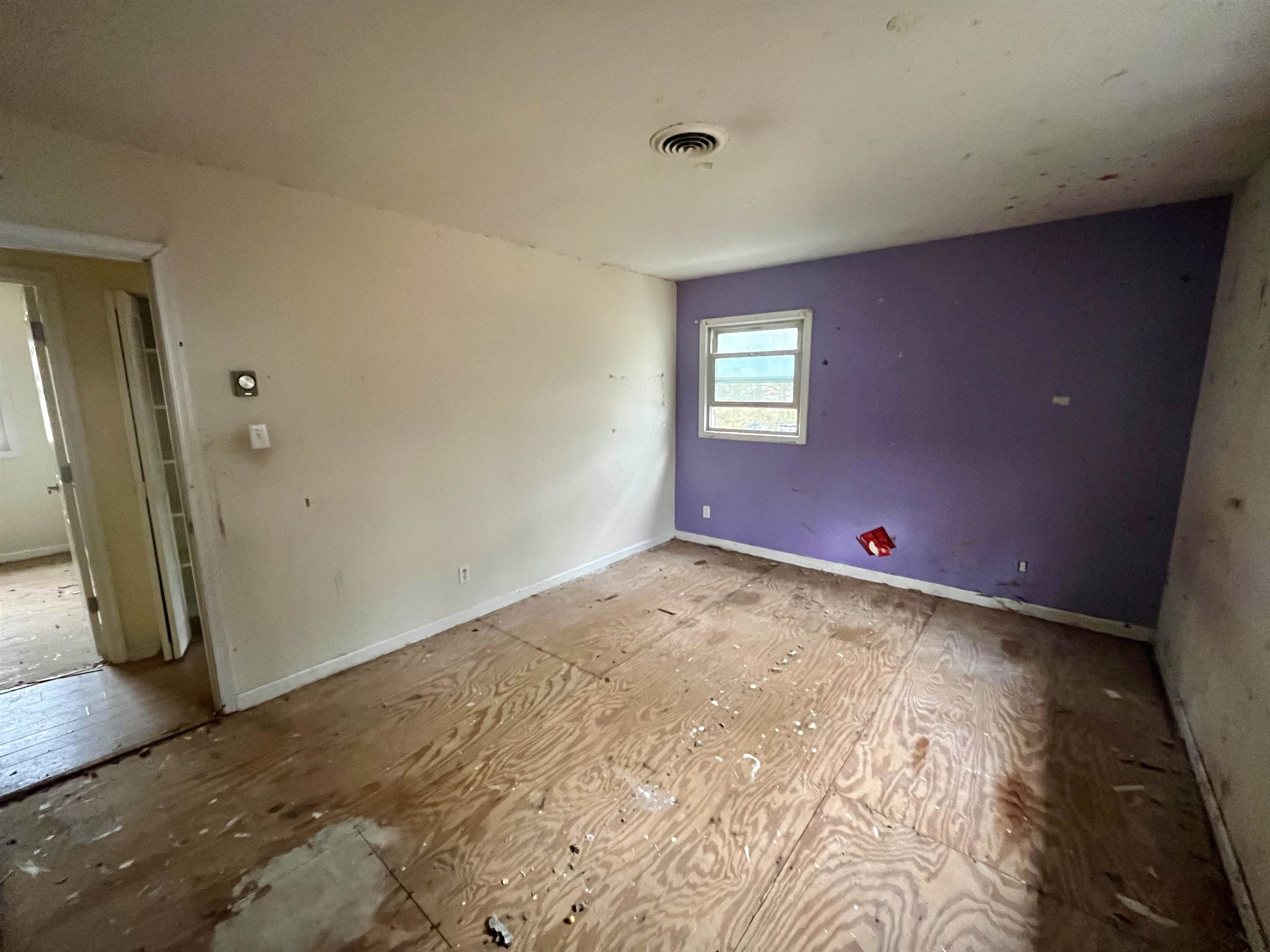 3672 Airport Acres Road Charlottesville, VA 22911 - Photo 20 of 49 an empty room with wooden floor and entrance