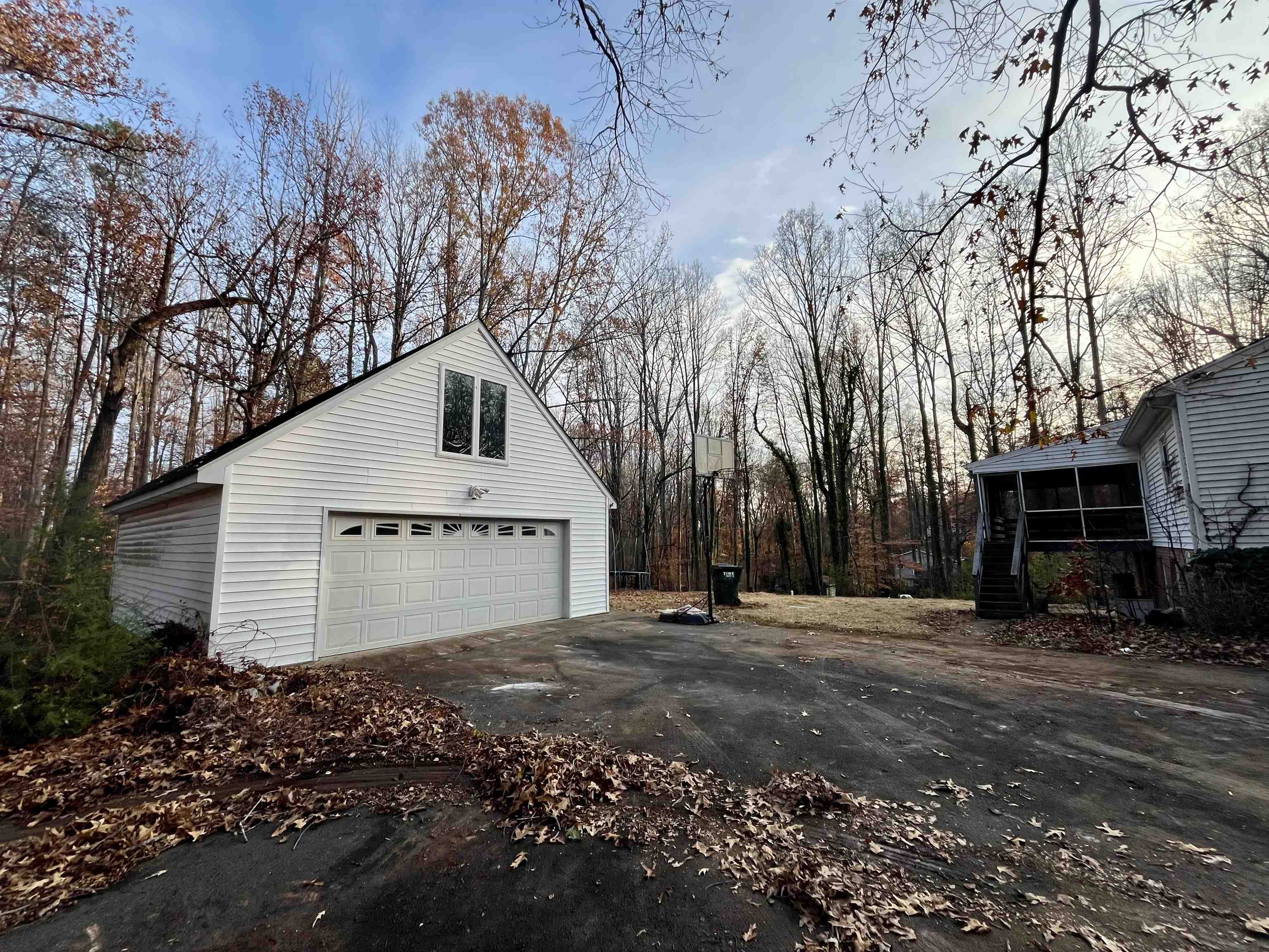 3672 Airport Acres Road Charlottesville, VA 22911 - Photo 48 of 49 a front view of a house with a yard and trees