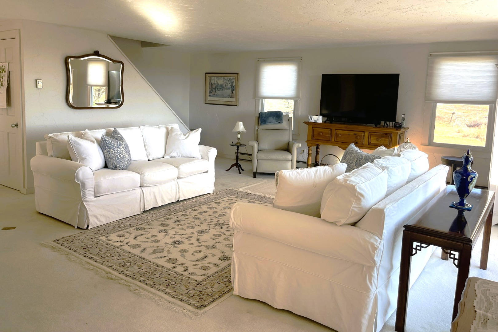 118 Eel Point Road Nantucket, MA 02554 - Photo 11 of 16 a living room with furniture and a flat screen tv