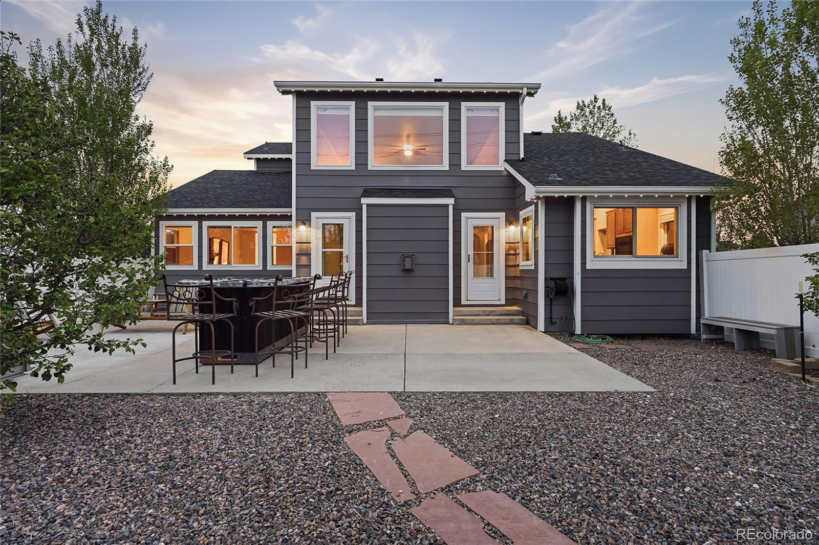 9288 Rockingham Drive Peyton, CO 80831 - Photo 42 of 49 front view of a house with a yard