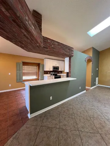 a view of kitchen and window