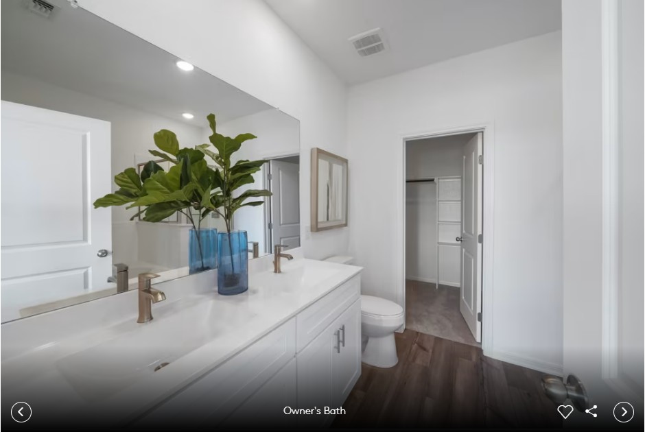 201 Adlai Avenue Georgetown, TX 78633 - Photo 7 of 8 a bathroom with a sink a toilet and a mirror