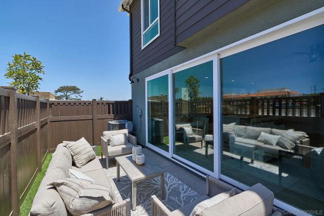 a building outdoor space with patio furniture