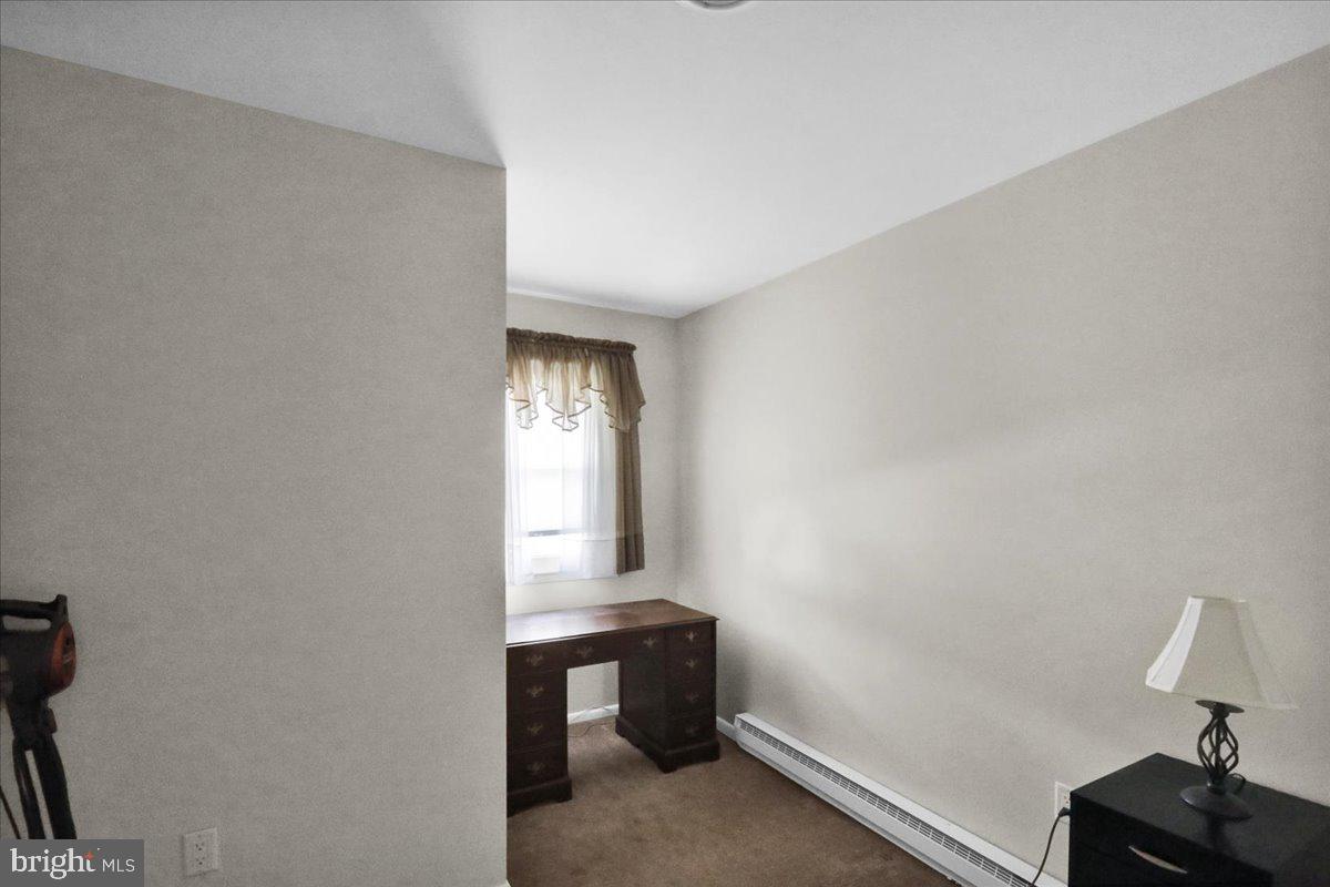 112 Brown Street Reading, PA 19606 - Photo 17 of 32 a view of an empty room and window
