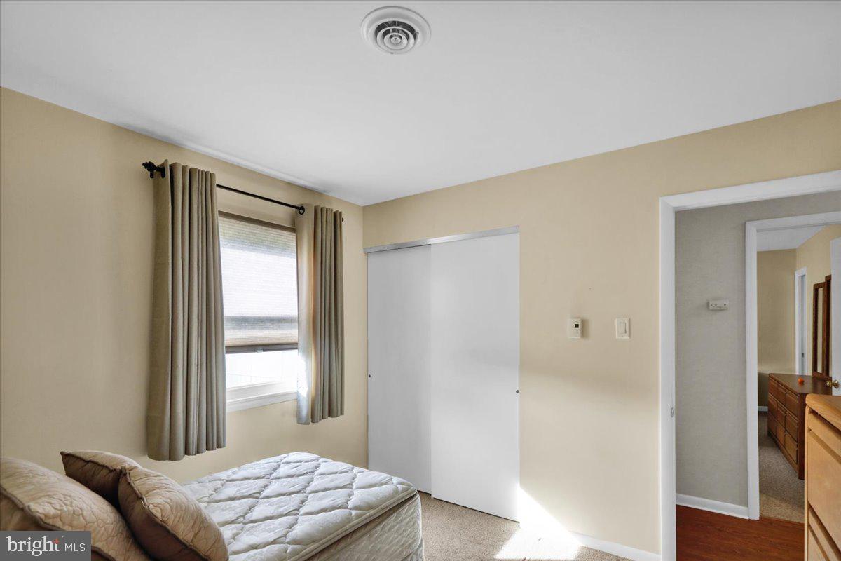 112 Brown Street Reading, PA 19606 - Photo 26 of 32 a bedroom with a bed and a window