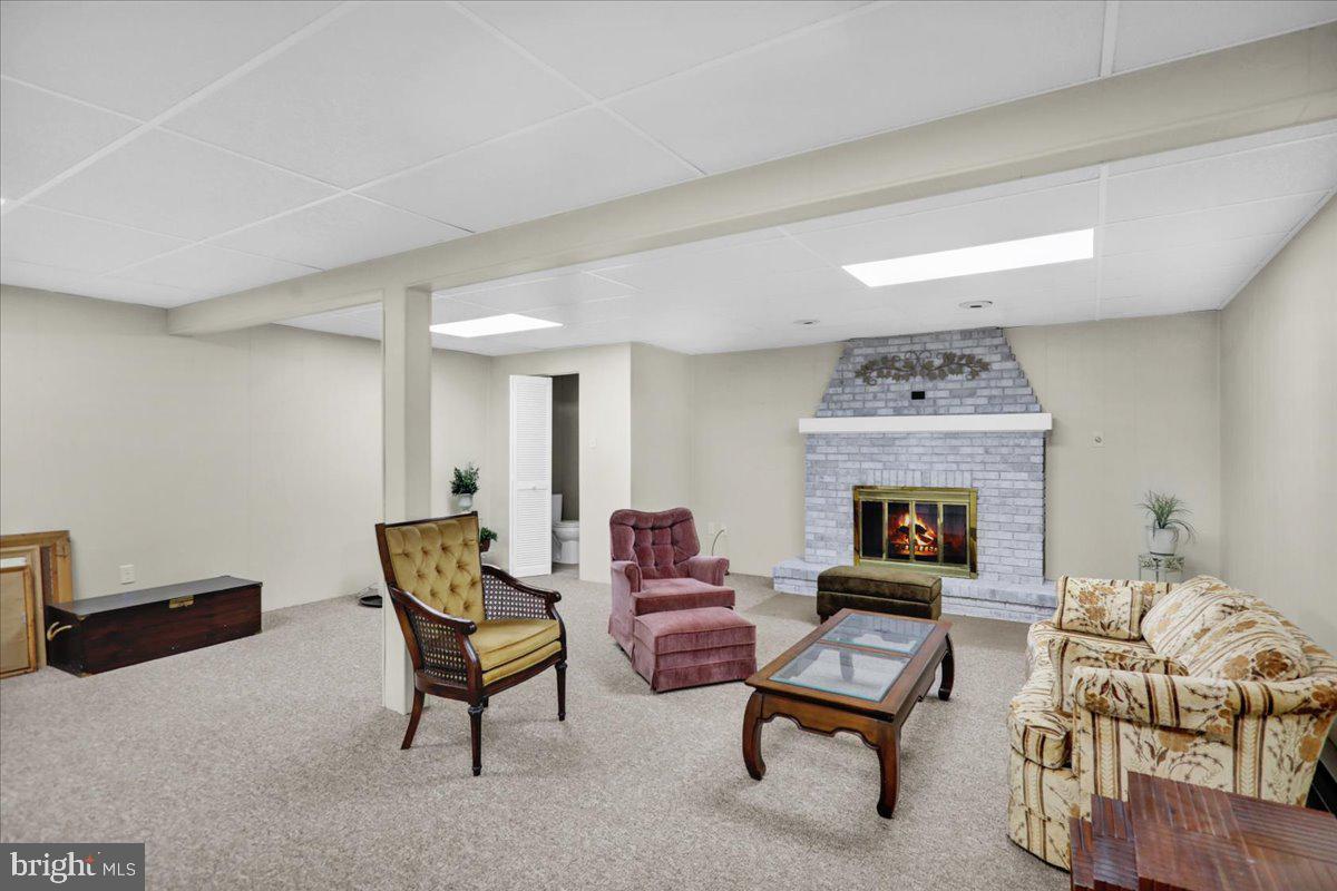 112 Brown Street Reading, PA 19606 - Photo 27 of 32 a living room with furniture and a fireplace