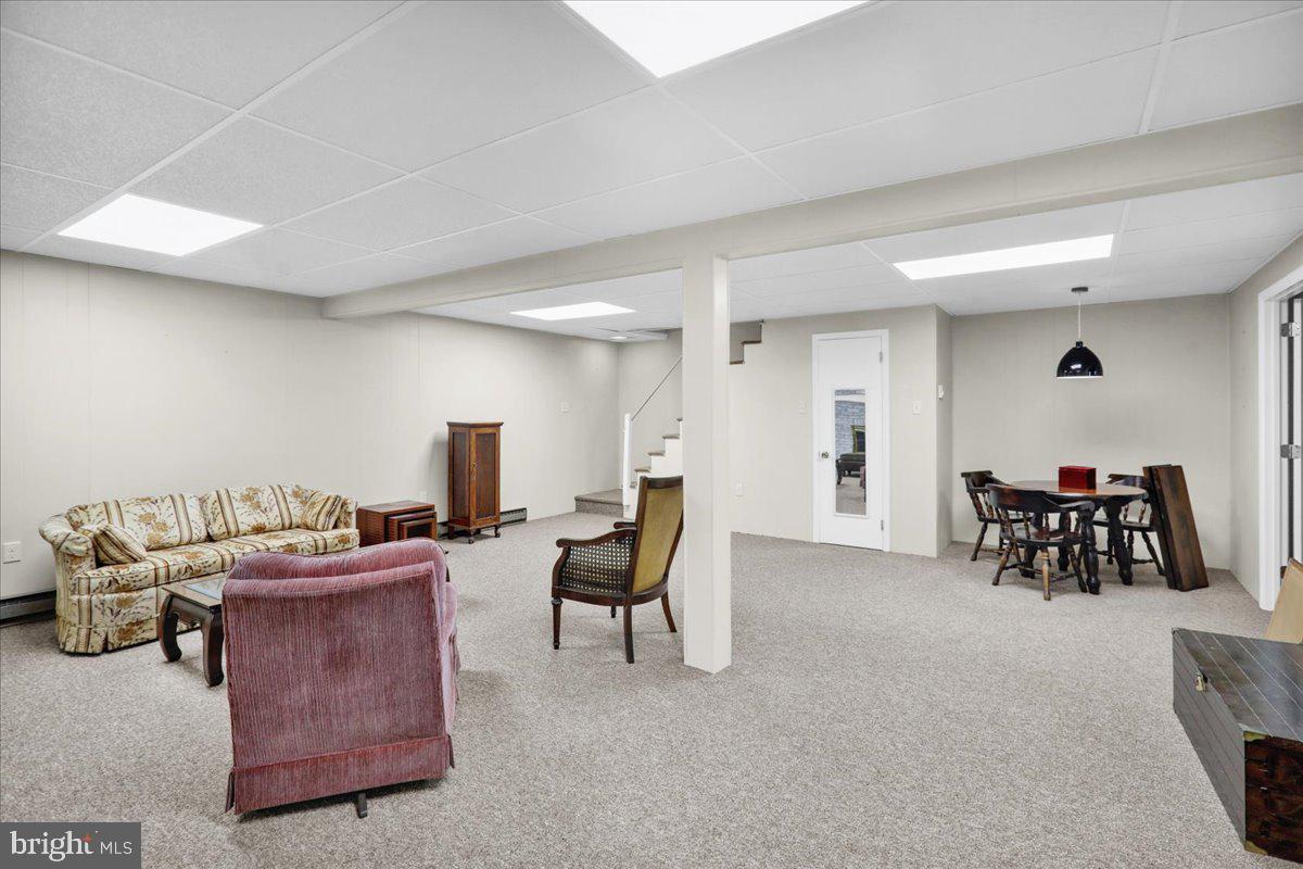 112 Brown Street Reading, PA 19606 - Photo 29 of 32 a living room with furniture and white walls