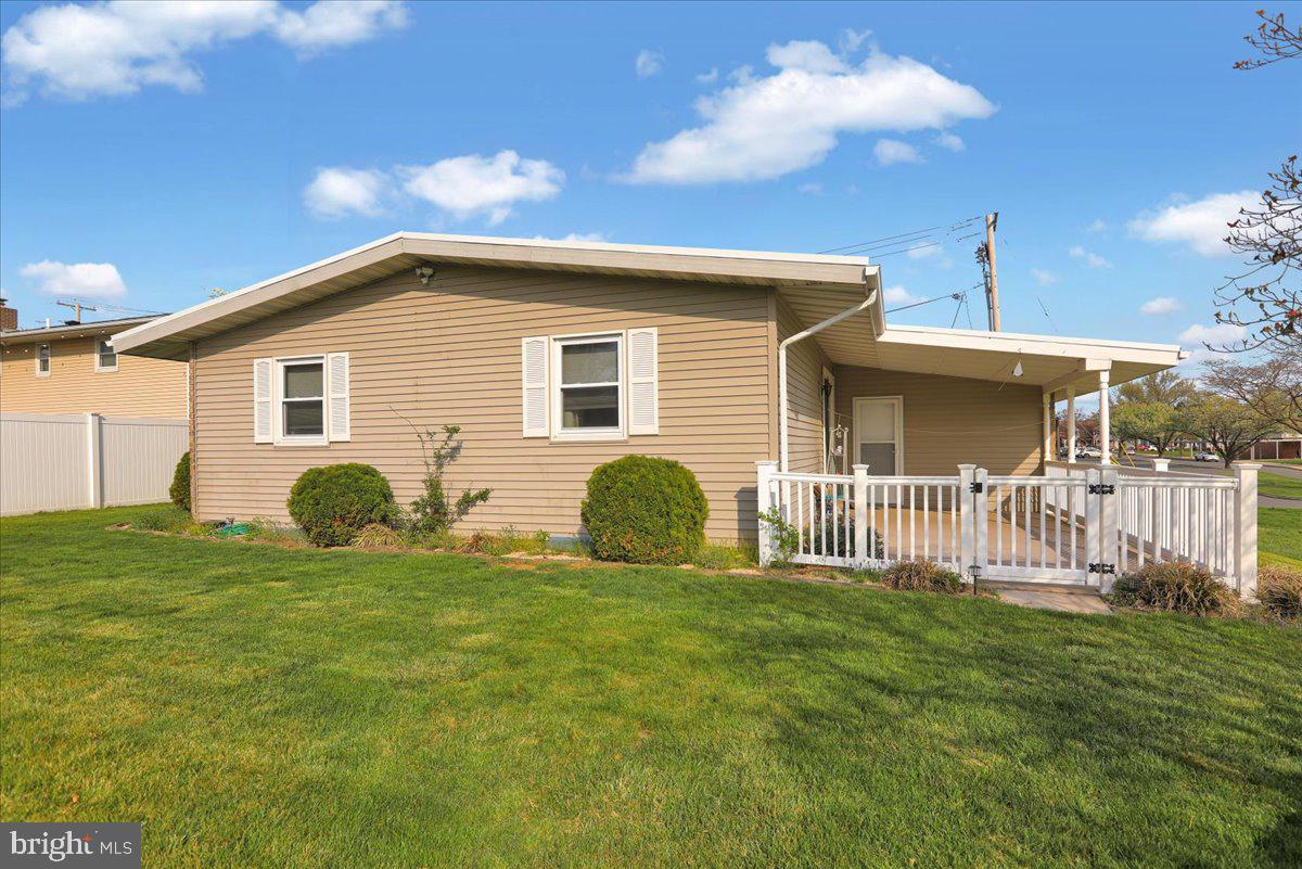 112 Brown Street Reading, PA 19606 - Photo 4 of 32 a view of a house with a yard