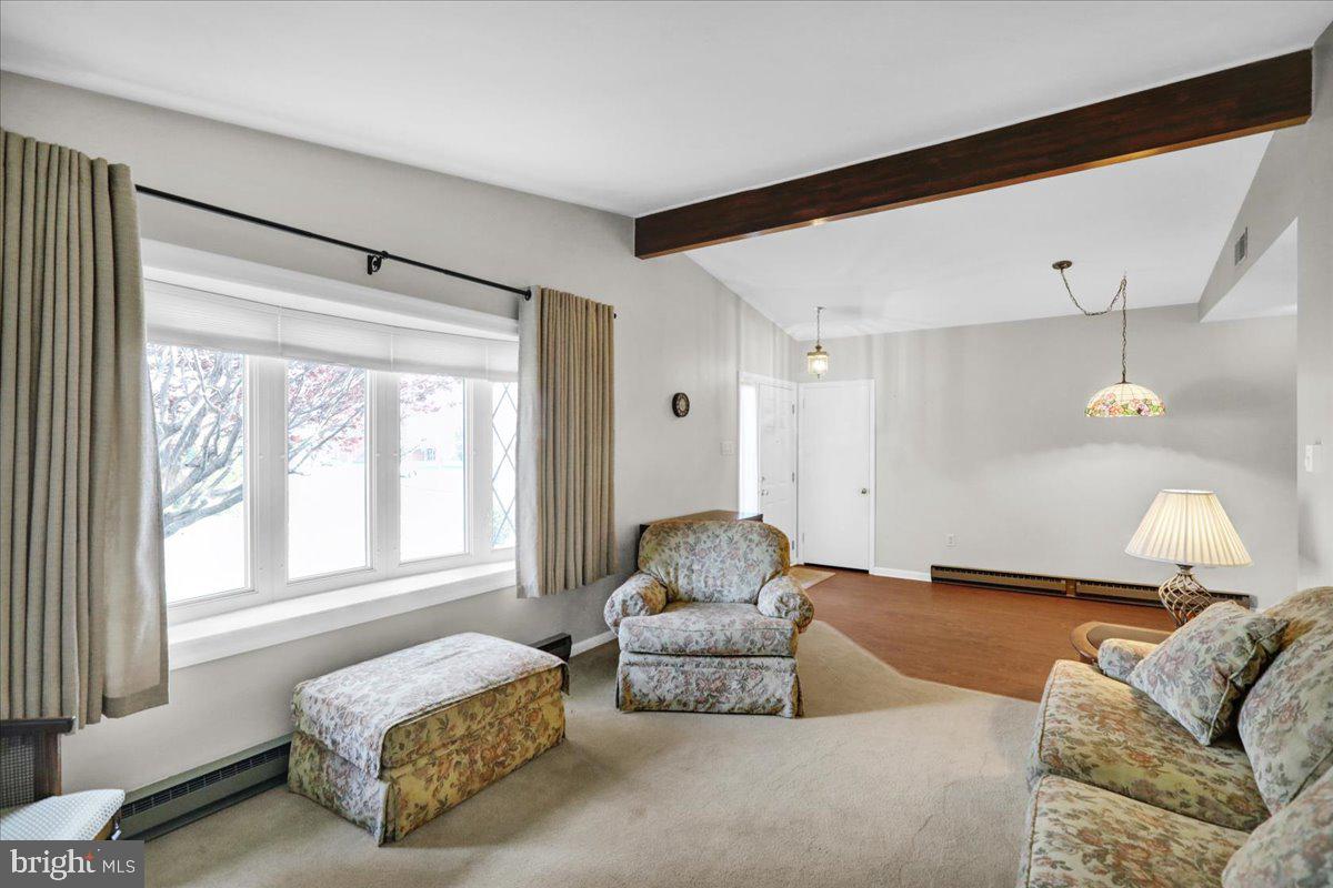 112 Brown Street Reading, PA 19606 - Photo 8 of 32 a living room with furniture and a large window