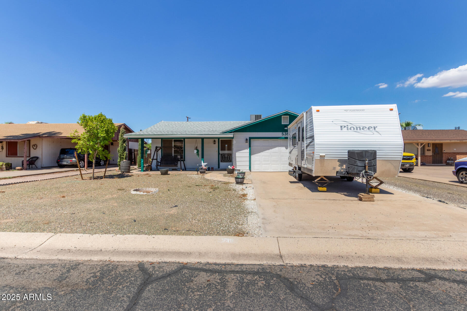 538 East Fred Avenue Apache Junction, AZ 85119 - Photo 1 of 20 a view of a house with outdoor space and a car parked