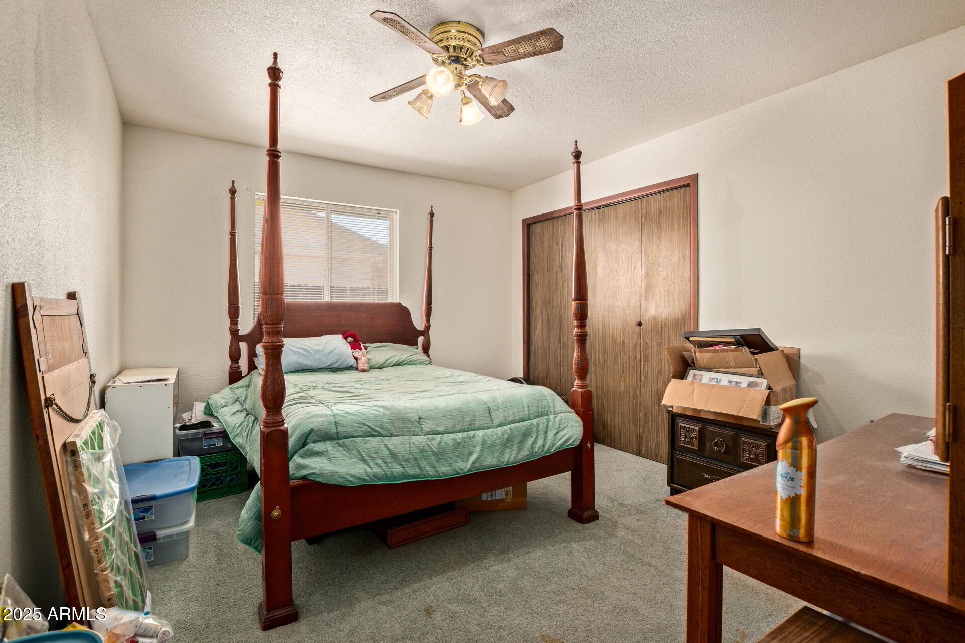 538 East Fred Avenue Apache Junction, AZ 85119 - Photo 15 of 20 a bedroom with a bed and a table