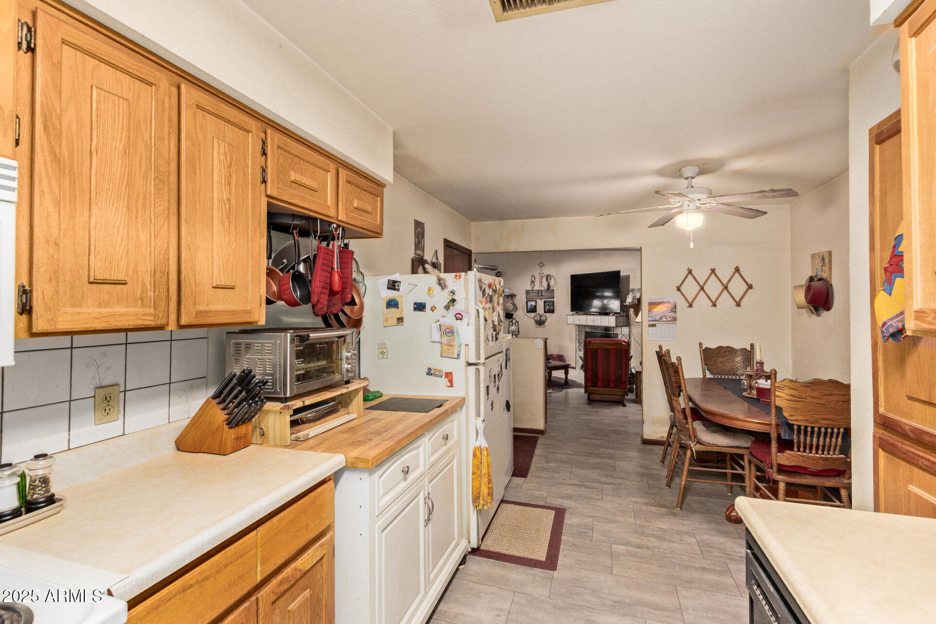 538 East Fred Avenue Apache Junction, AZ 85119 - Photo 10 of 20 a view of a kitchen with appliances and cabinets
