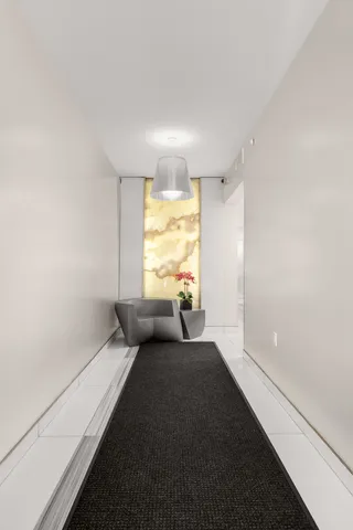 a view of roof deck with patio