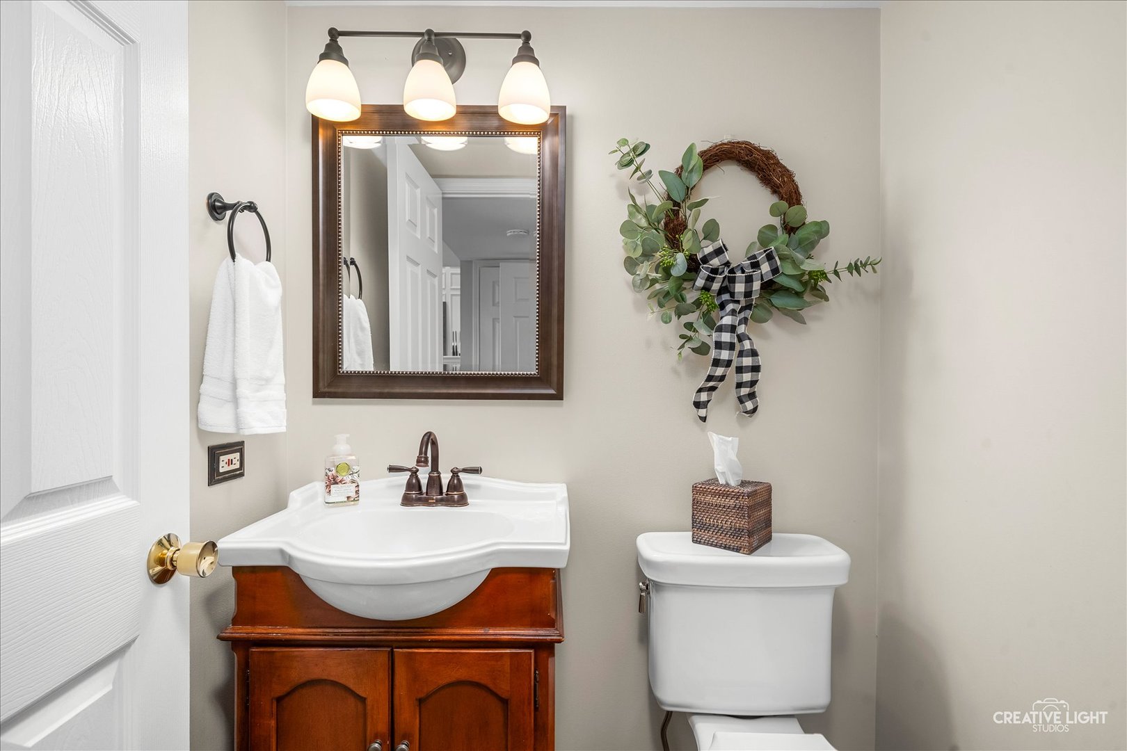 7 Falcon Ridge Court Algonquin, IL 60102 - Photo 19 of 51 a bathroom with a sink a toilet and mirror
