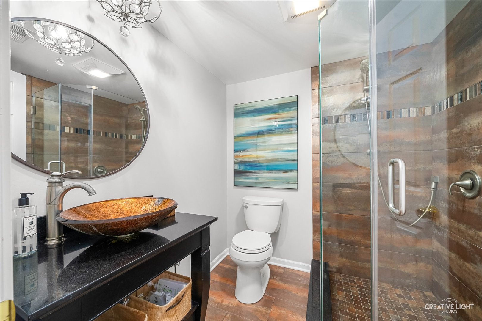 7 Falcon Ridge Court Algonquin, IL 60102 - Photo 23 of 51 a bathroom with a toilet a sink and a mirror
