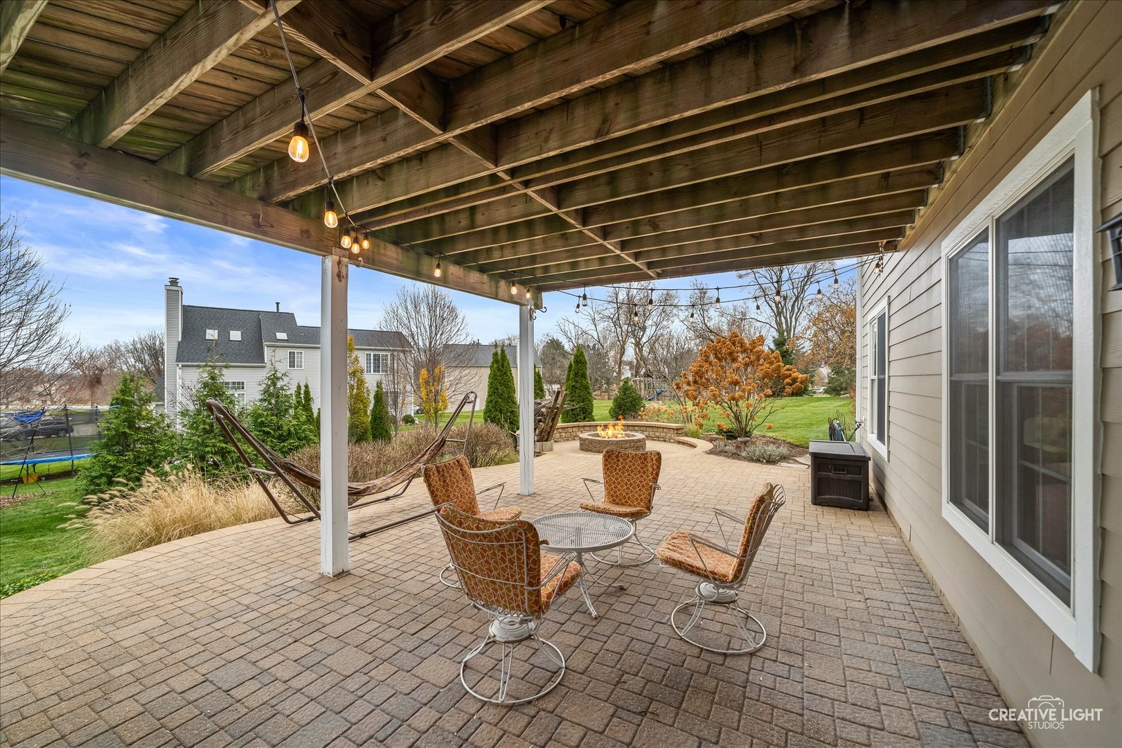 7 Falcon Ridge Court Algonquin, IL 60102 - Photo 43 of 51 a patio with yard glass top table and chairs