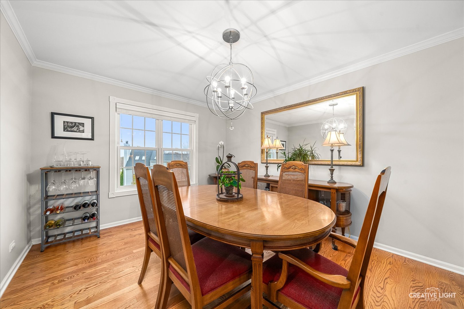 7 Falcon Ridge Court Algonquin, IL 60102 - Photo 8 of 51 a view of a dining room with furniture and chandelier