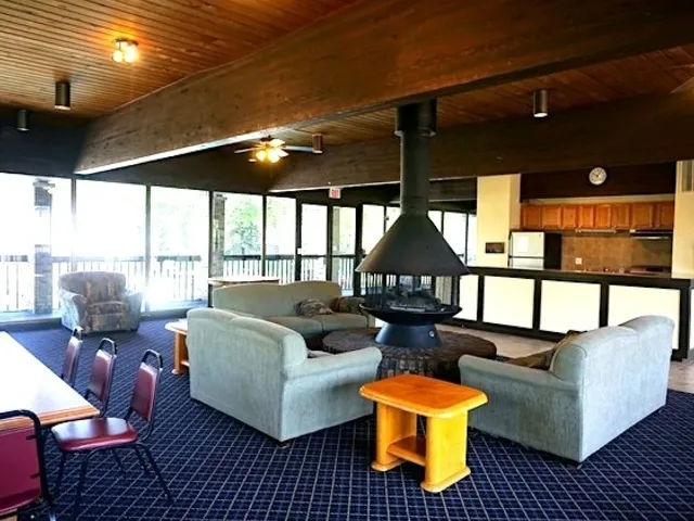 a view of a swimming pool with a patio