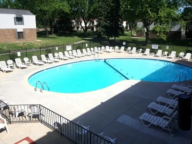 a view of a house with a iron gate