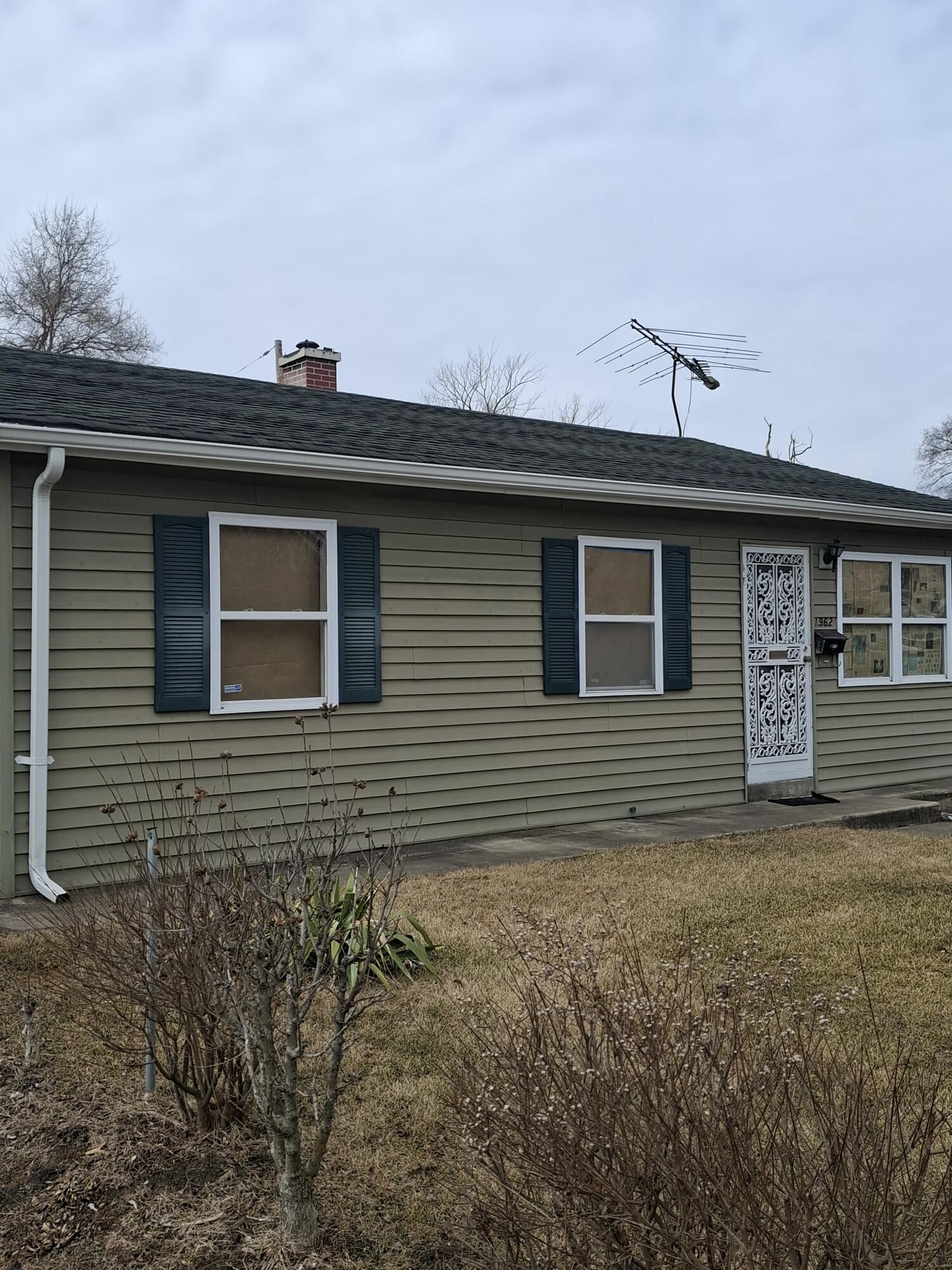 1962 Whitcomb Street Gary, IN 46404 - Photo 3 of 12 a view of a house with a yard