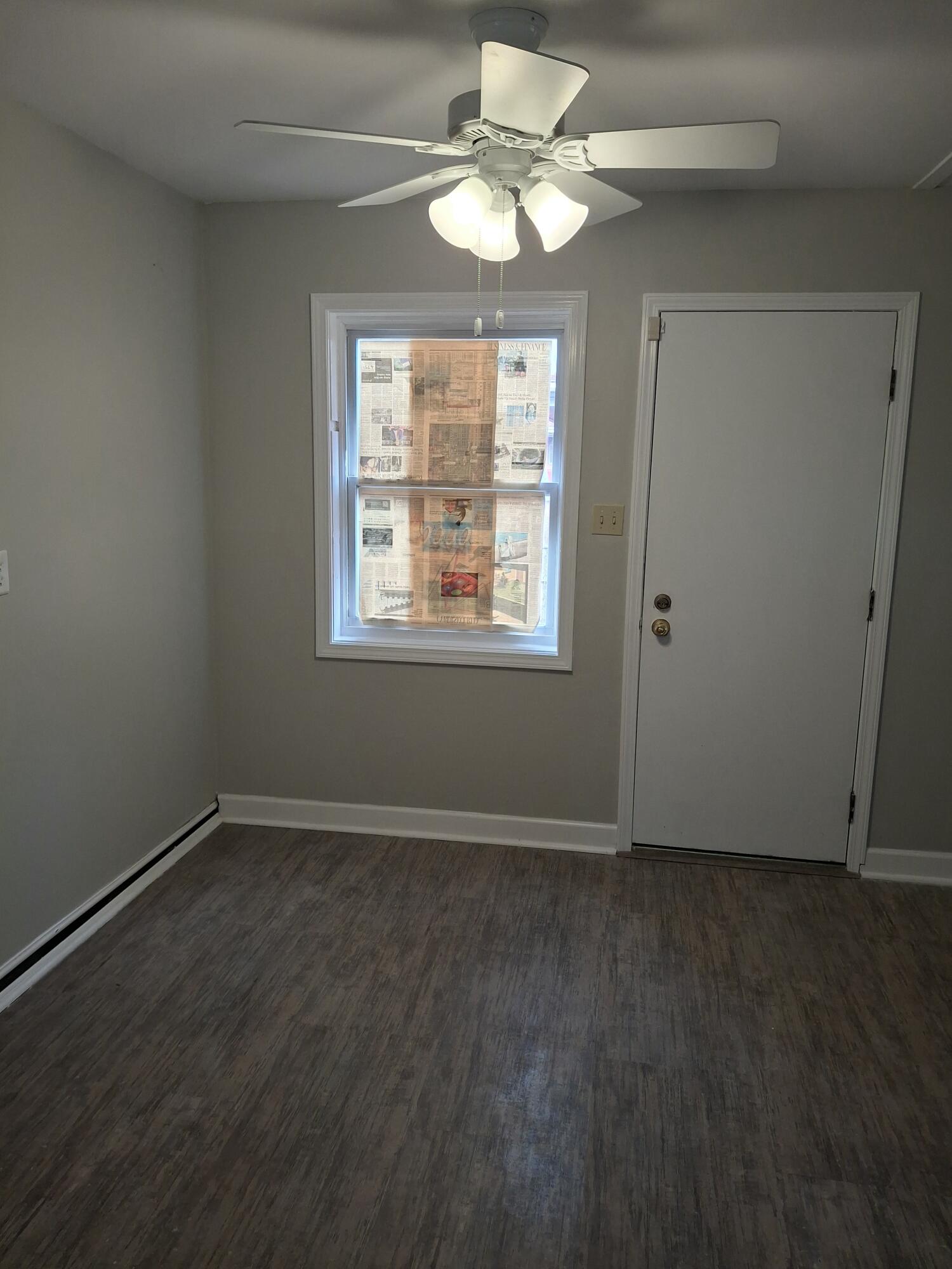 1962 Whitcomb Street Gary, IN 46404 - Photo 5 of 12 a view of an empty room with a window