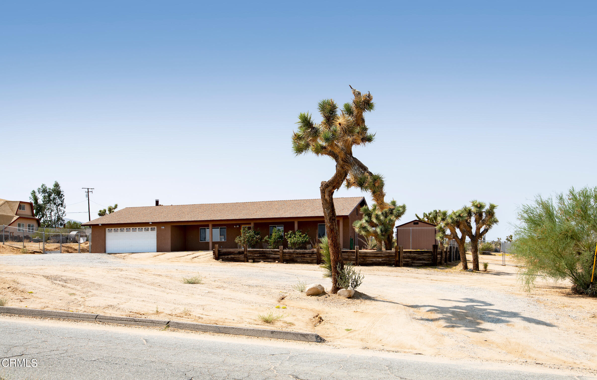 6864 Sunnyhill Road Joshua Tree, CA 92252 - Photo 3 of 71 a house view with a outdoor space
